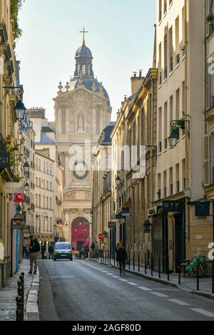 Street view of Rue de Sévigné with the Église Saint-Paul-Saint-Louis church (17th century) in the historic district of the Marais, Paris, France Stock Photo