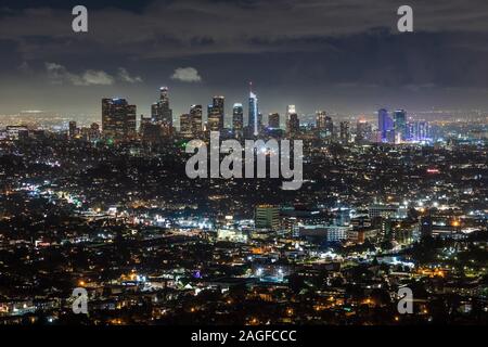 Aerial view of the Los Angeles skyline at sunset with pink sky and ...
