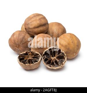 Whole and halved dried white limes isolated on white background Stock Photo