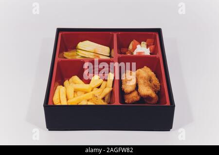 Child food. Funny food. Plate with cutlets and mashed potatoes in the form of a monkey faces. Children's menu Stock Photo