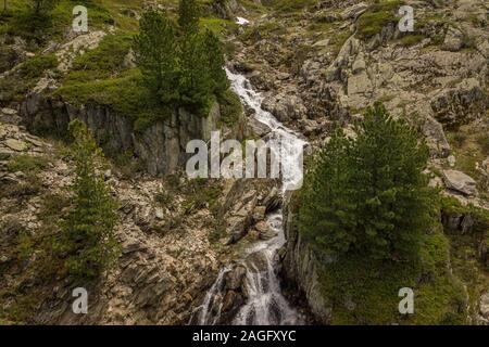 Aerial view of waterfall of brook in mountains of the French alps Stock Photo