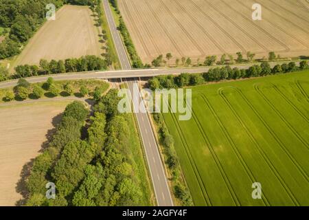 Bridge passing road in countryside in Germany in summer Stock Photo
