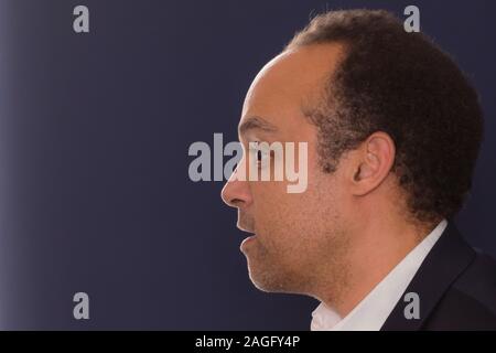 African american business coach gives presentation for businesspeople, multiracial and multiethnic business peoople at conference meeting room. Stock Photo