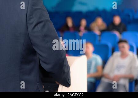 African american business coach gives presentation for businesspeople, multiracial and multiethnic business peoople at conference meeting room. Stock Photo