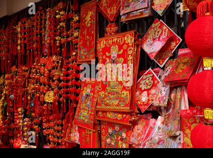 Embroidered cloth of God of Wealth or cai shen ye in chinese, the chinese language seen in the image are best wishes mean receive wealth in abundance Stock Photo