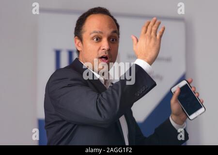 African american business coach gives presentation for business people, multiracial and multiethnic business peoople at conference meeting room. Stock Photo