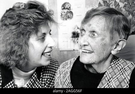 Carer & elderly woman, Nottingham UK 1992 Stock Photo