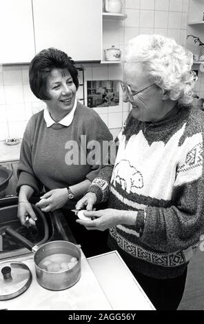 Carer & elderly woman Nottingham UK 1992 Stock Photo