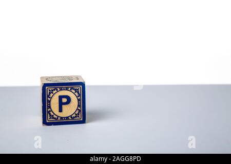 Childrens Wooden Alphabet Block Showing the Letter P Stock Photo