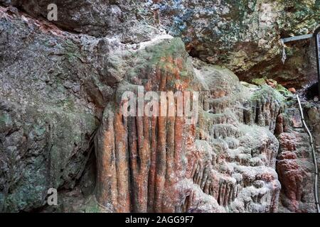 Drogarati cave on Cephalonia Island illuminated in orange, Greece Stock Photo