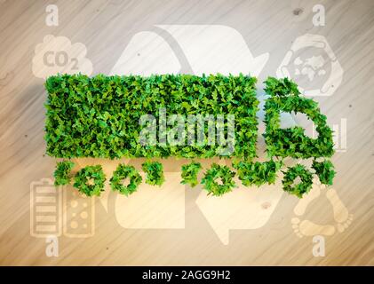 Ecology logistics concept. 3D illustration of a green truck on wooden desk with related ecology icons. Stock Photo