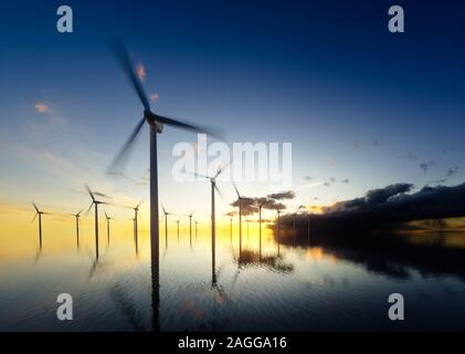Offshore wind turbines at daybreak. 3d rendering. Stock Photo