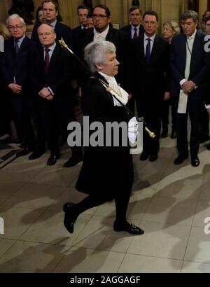 Lady Usher of the Black Rod Sarah Clarke walks through the Members' Lobby in the House of Commons during the State Opening of Parliament by Queen Elizabeth II, at the Palace of Westminster in London. Stock Photo