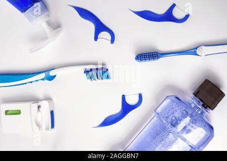 Flat lay with dental care products on white background. Stock Photo
