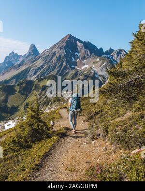 Female hiker trekking, Winchester Mountain, North Cascades, Washington, USA Stock Photo