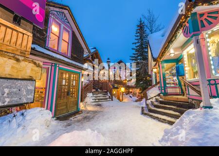 Breckenridge, Colorado, USA downtown streets at night in the winter with holiday lighting. Stock Photo