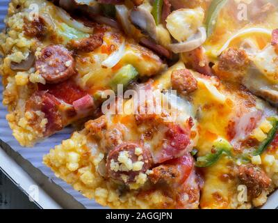Close up of Pizza in a delivery cardboard box Stock Photo
