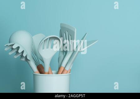 Kitchen utensils, home kitchen tools, mint rubber accessories on dark  background. Restaurant, cooking, culinary, kitchen theme. Silicone spatulas  and Stock Photo - Alamy