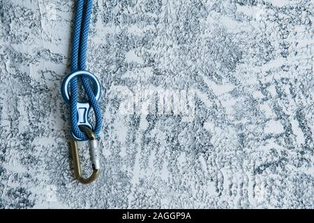 One object only. Knot with metal carabiner. Silver colored device for the active sports Stock Photo
