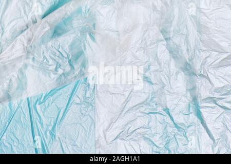 Plastic bags texture on blue background. Zero waste conept. Stock Photo