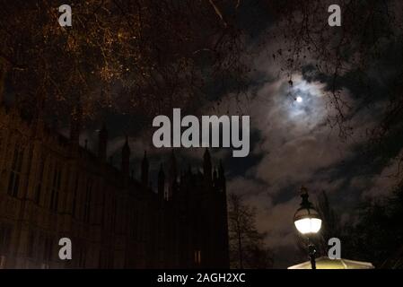 A full moon illuminated corner of the House of Commons in London, home of the UK parliament Stock Photo
