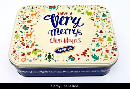 Mcvities assorted tin of biscuits on a white background Stock Photo