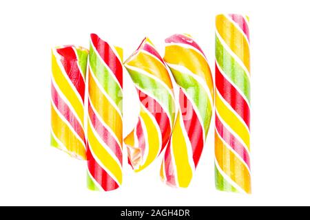 Tasty broken colorful striped candy cane isolated on white background Stock Photo