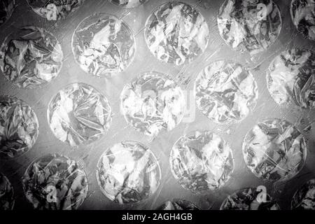 Close up of plastic protective bubble wrap texture, black and white image Stock Photo