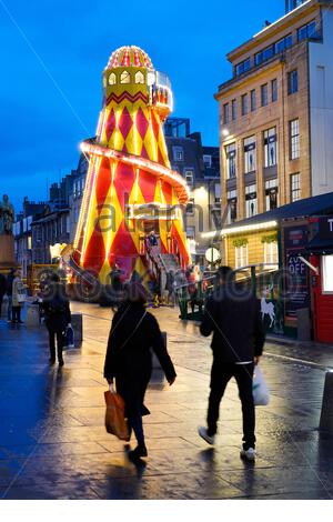 Edinburgh, Scotland, UK. 19th  Dec 2019. Helter Skelter christmas funfair in Castle Street at dusk.  Credit: Craig Brown/Alamy Live News Stock Photo