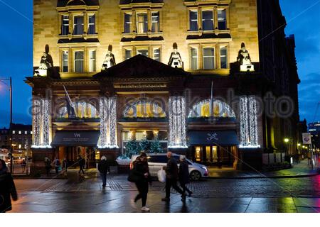 Edinburgh, Scotland, UK. 19th  Dec 2019. Waldorf Astoria Edinburgh Caledonian Hotel decorated in Christmas lights at dusk.  Credit: Craig Brown/Alamy Live News Stock Photo