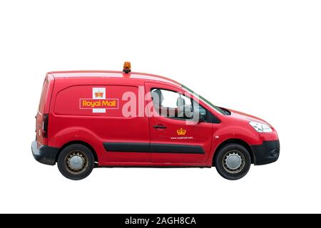 UK postman driving red Peugeot Partner British Royal Mail post van against white background Stock Photo