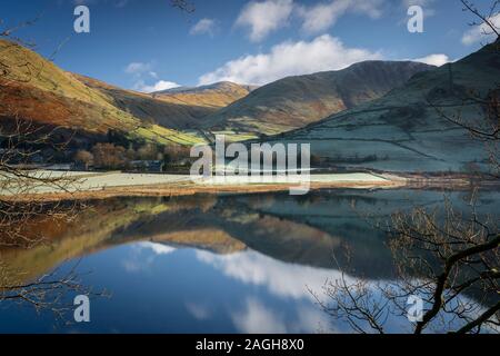 Crystal clear reflections on Brothers Water in the Hartstop Valley, Cumbria, UK. Stock Photo