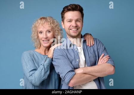 Two mature man and woman looking confident at camera Stock Photo