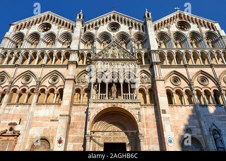 Facade of the 12th century Romanesque Ferrara Duomo, Italy Stock Photo