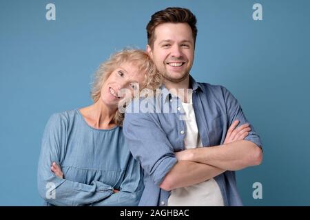 Two mature man and woman looking confident at camera Stock Photo