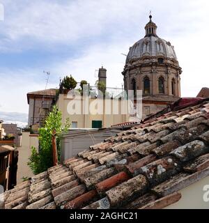 Rooftops and dome (one of the largest in Rome, San Carlo ai Catinari, an early baroque-style church, located on Piazza Benedetto Cairoli, Rome, Italy. Stock Photo