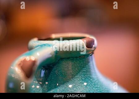 Neck of an azure and brown jar Stock Photo