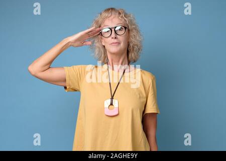 . Mature woman is ready to start working. Studio shot Stock Photo
