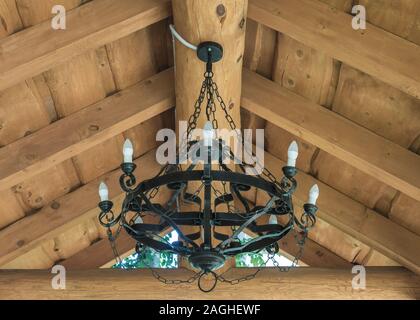 Round Black Wrought Iron Chandelier With Bulbs Weighs In The