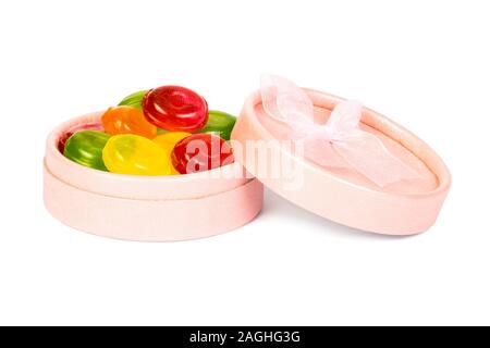 Drop candies in a box Stock Photo