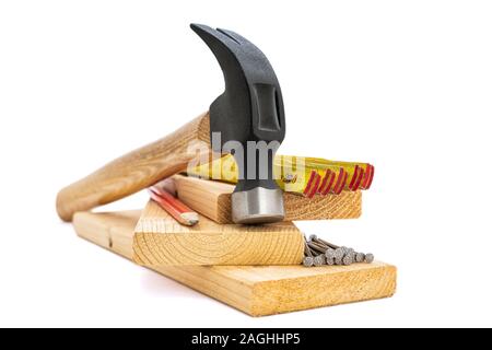 Close-up of hammer and carpenter's tools on a white background. Construction industry, do it yourself. Stock Photo