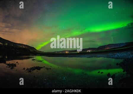 Aurora Borealis (Northern lights) dancing over Iceland. Stock Photo