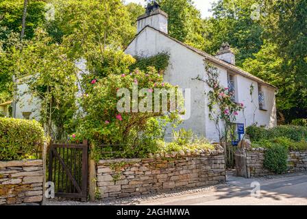 Dove Cottage, a small cottage on the outskirts of Grasmere where the poet William Wordsworth lived from 1799. Stock Photo