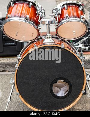 Close up of the bass and two tom toms of a drum set outdoors. Stock Photo