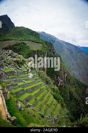 The terraces or agricultural platforms of the Inca Empire, Machu Picchu Cusco Stock Photo