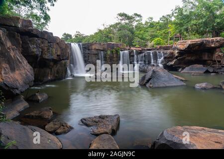 Beautiful Tatton waterfall, the travel destination in national public park in Thailand Stock Photo