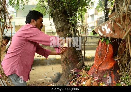 NAGPUR, MAHARASHTRA, INDIA - AUGUST 01 : People worship of Snake God in 'Nag Panchami' festival. It is traditional worship of snakes or serpents obser Stock Photo