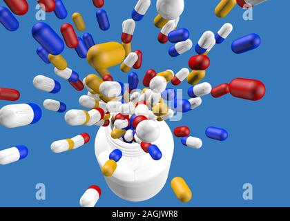 Close up from above of group of yellow, blue and red medicine capsules flying out of the inside of a white plastic bottle without lid on blue backgrou Stock Photo