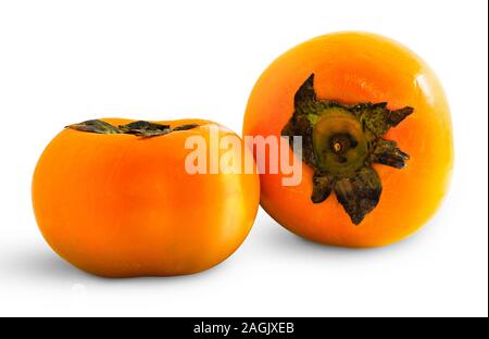 Pair of ripe persimmon fruits isolated on white background. Two whole persimmons with clipping path Stock Photo