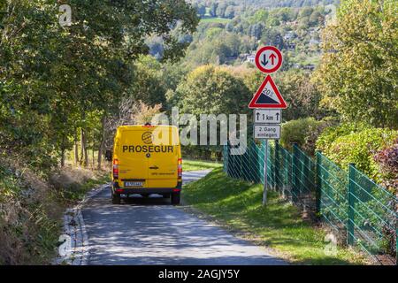 Prosegur money transporter on a steep gradient road in the Saxon Switzerland-Eastern Ore Mountains district Stock Photo